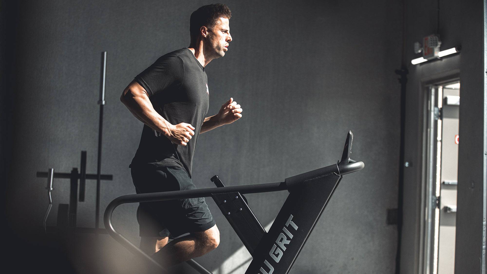 Elevate Your Workout with the Grit Runner Curved Manual Treadmill - Unleash Your Fitness Potential!