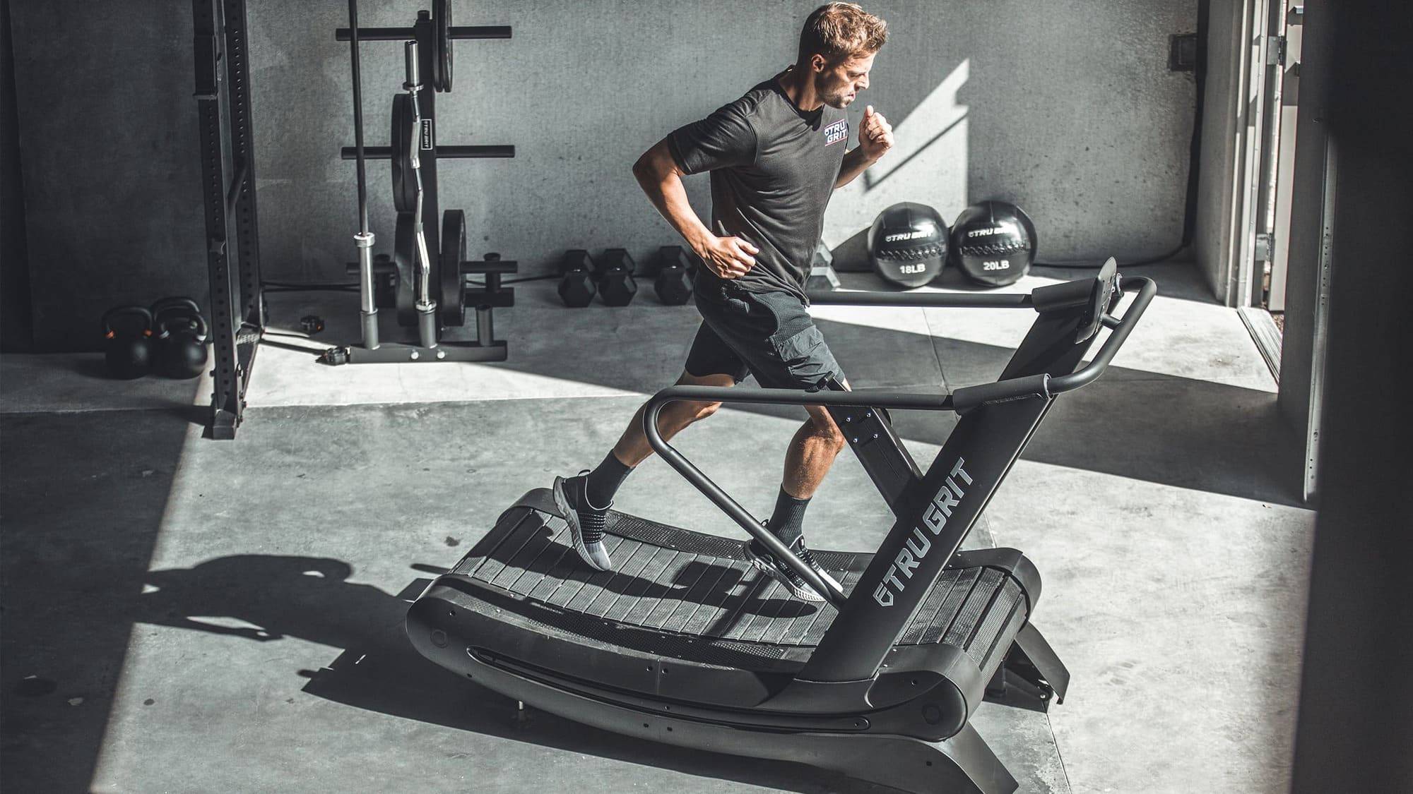 Elevate Your Workout with the Grit Runner Curved Manual Treadmill - Unleash Your Fitness Potential!